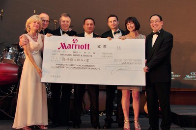 Marriott Hotel's General Managers Present the Check to Shanghai Roots & Shoot.